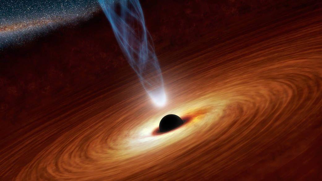 Ученые стали свидетелями долгой смерти звезды в пасти черной дыры